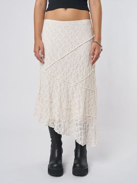 Discover your next go-to piece like our Nolia Cream Lace Asymmetric Midi Skirt, featuring boho lace material and sheer lace floral all over. For more women’s ethically made and aesthetic clothing y2k styles, Fairycore and more, shop online at Minga London. Long White Lace Skirt, Latina Aesthetic Outfit, Asymmetrical Skirt Outfit, Greece Outfit Ideas, Wedding Skirts, Streetwear Fashion Aesthetic, Sabrina Concert, Japan Clothes, Edgy Tops