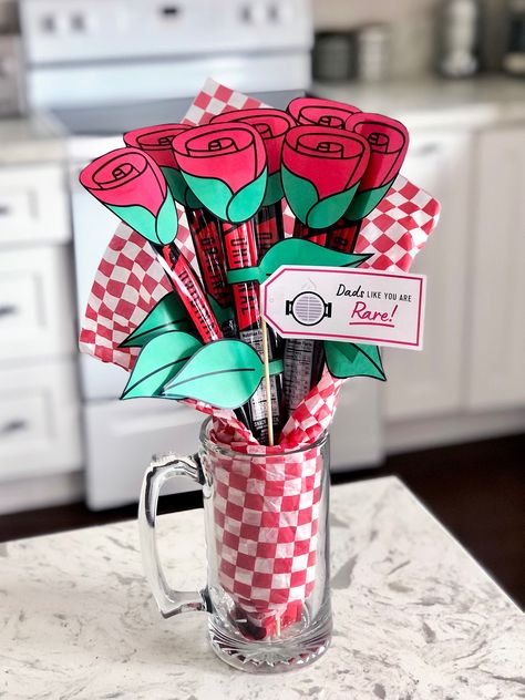 "DIY Meat Bouquet Jerky Flowers Jerky Bouquet Meat Flowers Beef Jerky Bouquet Fathers Day Bouquet Gift Card Bouquet Our Printable Rose Toppers & Leaf Wraps transform Meat Sticks or BBQ utensils into the perfect bouquet to gift any meat-loving, Grill Master for Father's Day, Valentines Day their Birthday and or an Anniversary! Simply cut, wrap, tape and gift! Other Bouquets (Sold Separately) https://www.etsy.com/shop/pixelsandpopbouquets?search_query=FB21 Solid-color Rose Toppers Available (Sold Separately) https://www.etsy.com/shop/pixelsandpopbouquets?search_query=FB23 WHAT'S INCLUDED You will instantly access a high resolution printable PDF file for the items below, complete with instructions and tips for easy printing and assembly! All of the following items can be printed at 100% scale Meat Bouquet For Him, Meat Stick Bouquet, Beef Jerky Flowers Diy, Beef Stick Bouquet, Diy Beef Jerky Bouquet, Father’s Day Bouquet, Birthday Bouquet For Him, Fathers Day Bouquet, Mens Bouquet