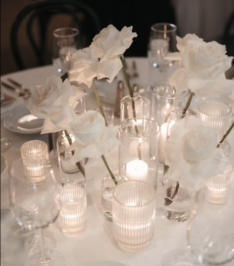 Single Rose And Candle Centerpiece, Simple White Rose Centerpiece, Rose Bud Vase Centerpiece, Bud Vase Candle Centerpiece, Bud Vase Round Table, Round Table Bud Vase Centerpiece, Bud Vases And Candles Centerpiece, Round Table Centerpieces Wedding, Floral Candle Centerpieces