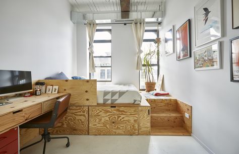 "The smaller room seconds as Sam’s office, with a plywood platform bed that has giant storage drawers underneath. I saw this design on Pinterest and we cobbled it together with our contractor and the cheapest possible wood we could find.” Credit: <a href="https://www.apartmenttherapy.com/authors/erin-derby">Erin Derby</a> Home Office With Bed, Jessica Bennett, Brooklyn Loft, Plywood Storage, Platform Bedroom, Platform Bed With Drawers, Plywood Interior, Japanese Room, Bed Platform