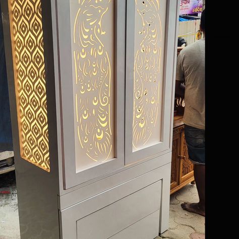 Customised acrylic Pooja mandir design wi tr h door and storage #acrylicmandir #acrylicmandirdesigns #acrylictemple #poojamandir #hometempledesigns #hometemple #temple #pocketdoor #templewithstorage #templewithdoor #plywoodmandir #woodenmandir #customisedtemple #acrylicdoormandir Do you prefer door or Open temple Pooja Mandir Design, Mandir Design, Pooja Mandir, Acrylic Design, Home Temple, Acrylic Designs, Lasercut Design, Pocket Doors, Cut Design