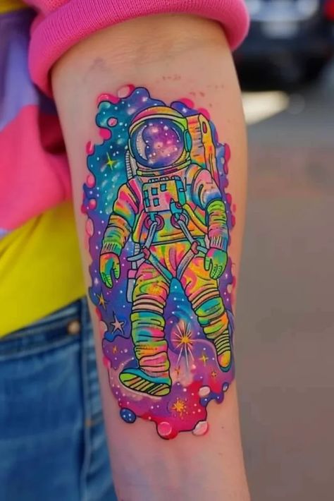 Meaning of Astronaut Tattoo | 100+ Astronaut Tattoo Designs Astronaut Tattoos, Colorado Tattoo, Ufo Tattoo, Astronaut Tattoo, Balloon Tattoo, Uv Tattoo, Rainbow Tattoos, Planet Tattoos, Marvel Tattoos