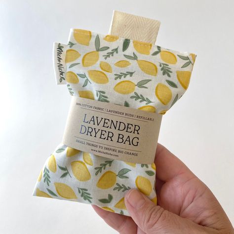 "This refillable dryer bag is an awesome replacement for single use dryer sheets. It is filled with high-quality lavender buds, and securely closes with strong hook and loop. Pull tabs at the opening make it easy to open so you can switch out to new filling. When purchasing select your preferred fabric dryer bag (which comes full of lavender buds) or dryer bag refill (to freshen your lavender bag once the smell diminishes. Simply place the sealed bag in your dryer when drying your clothing, or l Lavender Dryer Bags, Rice Bags, Lavender Field, Scented Sachets, Lavender Bags, Lavender Buds, Lavender Sachets, Dryer Sheets, Laundry Supplies