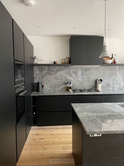 Matt black kitchen dressed in grey marble top Black Cupboards Kitchen, Black Kitchen Inspiration, Luxury Black Kitchen, Dirty Kitchen Design, Grey Marble Kitchen, Black Kitchen Design, Grey Cupboards, Light Gray Cabinets, Grey Kitchen Cabinets