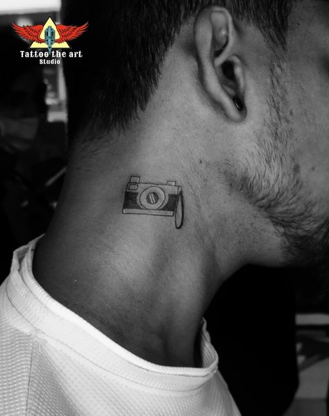 Small camera tattoo For neck Small Camera Tattoo, Tattoo For Neck, Camera Tattoos, Camera Tattoo, Artist Tattoo, Neck Tattoo For Guys, Bride Photography Poses, Small Camera, Bride Photography