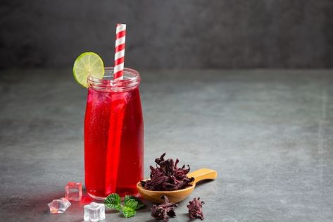 Free photo roselle juice in a ready-to-d... | Free Photo #Freepik #freephoto #hibiscus-tea #flower-tea #rose-tea #herbal-tea Parsley Tea Benefits, Roselle Juice, Roselle Flower, Summer Iced Drinks, Parsley Tea, Hibiscus Tea Benefits, Pomegranate Drinks, Cranberry Tea, Red Drinks