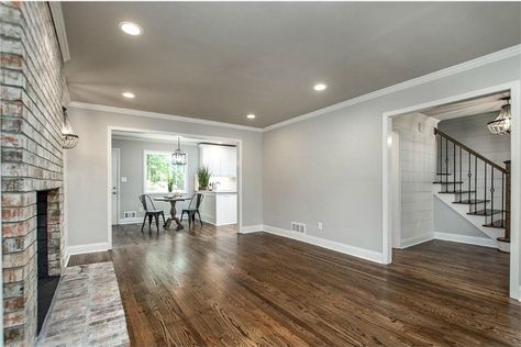 3/4 inch red oak hardwood floors, Minwax dark walnut stain with two coats of satin poly.  Wall color is Sherwin Williams Gossamer Veil. Red Wood Floors, Sherwin Williams Gossamer Veil, White Oak Wood Floors, Gossamer Veil, Cheap Wood Flooring, Floor Stain Colors, Red Oak Hardwood Floors, Redesign Ideas, Hardwood Floor Colors