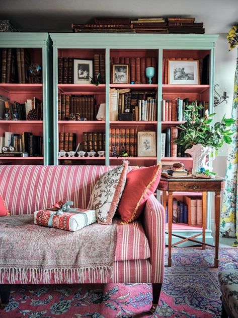 Bookshelves Behind Couch, Curated Bookshelf, Pink Library, Period Living, Brown Furniture, Decorating Shelves, Maximalism, Home Library, A Living Room