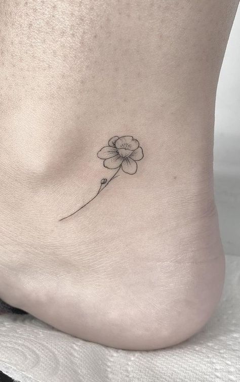 Daffodil And Ladybug Tattoo, Jonquils Tattoo, Micro Daffodil Tattoo, Daffodil Tattoo Birth Flower, Tiny Daffodil Tattoo Simple, Daffodil Tattoo Wrist, Daffodil With Butterfly Tattoo, Delicate Daffodil Tattoo, Minimalist Narcissus Tattoo