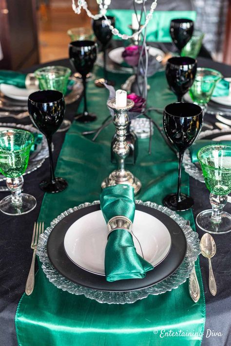 The Slytherin tablescape at our Harry Potter party. It was a big hit at our Halloween party but you could also use it for a birthday party or graduation party. Click through for more Harry Potter party decorating ideas. #entertainingdiva #harrypotter #harrypotterparty #halloween #birthdayparty #partyideas #harrypotterparty Quinceanera Harry Potter Theme, Harry Potter Quinceanera Ideas, Harry Potter Quinceanera, Harry Potter Table Decor, Hogwarts Banner, Black Lace Candles, Harry Potter House Colors, Harry Potter Table, Lace Candle Holders