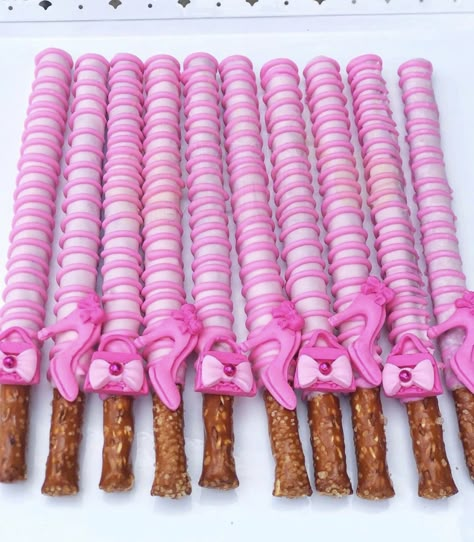 Barbie pretzels, Barbie treats, Barbie party Barbie Theme Chocolate Covered Treats, Barbie Chocolate Covered Pretzels, Barbie Pretzel Rods, Barbie Themed Birthday Party Treats, Barbie Inspired Treats, Barbie Pretzels, Barbie Inspired Snacks, Barbie Treats Ideas, Barbie Party Treat Table