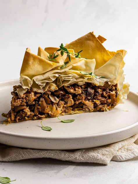 Inspired by the classic Greek manitaropita, we made this mushroom pie with crispy layers of filo pastry and a filling of mushrooms, seared tofu, and herbs. Mushroom Phyllo, Seared Tofu, Phyllo Pie, Puff Pastry Recipes Savory, Mushroom Pie, Filo Pastry, Puff Pastry Recipes, Easy Delicious Recipes, Pastry Recipes