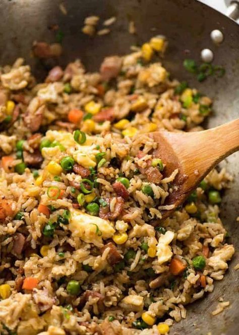 Close up of Egg Fried Rice in a wok with a wooden spoon, fresh off the stove Chinese Corn Soup, Takeout Recipes, Tin Eats, Chinese Bbq Pork, Making Fried Rice, Egg Fried Rice, Chinese Cooking Wine, Sauce For Rice, Pork Stir Fry