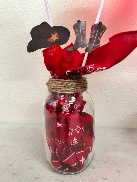 Western Mason Jar Centerpieces, Bandana Centerpiece Ideas, First Rodeo Table Centerpiece, Diy Western Centerpieces, Cowboy Hat Centerpiece Ideas, Rodeo Centerpieces, Western Theme Party Decorating Ideas, Cowboy Centerpieces, Western Centerpieces