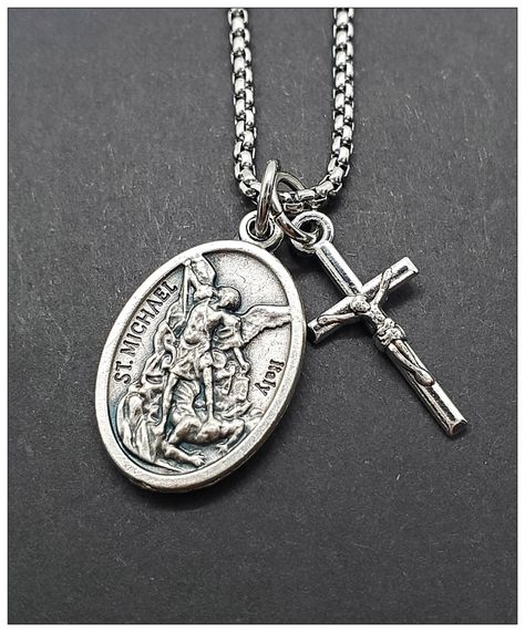 "St. Michael Necklace, Saint Michael Necklace, Police, Military Gift for Him or Her, Unisex, Archangel Michael Necklace, Catholic Comes in your choice of chain length. Can be for a child or an adult. This necklace is made with a lobster clasp closure. Chain is made of stainless steel. Cross pendant measures 1\" in length and is made of alloy silver. St. Charm measures 1\" in length as well and is made of oxidized silver. Double sided, one side has St. Michael, opposite side says Guardian Angel a St Michael Necklace, St Michael Pendant, Military Gift, St Benedict, Saint Michael, Heavy Chain, Military Gifts, Archangel Michael, Mini Pendants