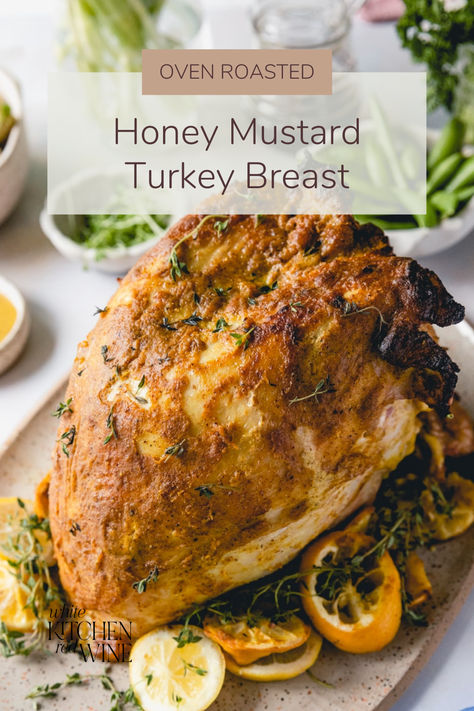 A image of a Oven Roasted Honey Mustard Bone-In Breast Turkey on a platter surrounded by herbs and cooked lemons that are cut in half Honey Mustard Turkey, Turkey Salisbury Steak, Homemade Honey Mustard Sauce, Moist Turkey, Homemade Honey Mustard, Turkey Breast Recipe, Roast Turkey Breast, Honey Mustard Sauce, Recipe Dinner