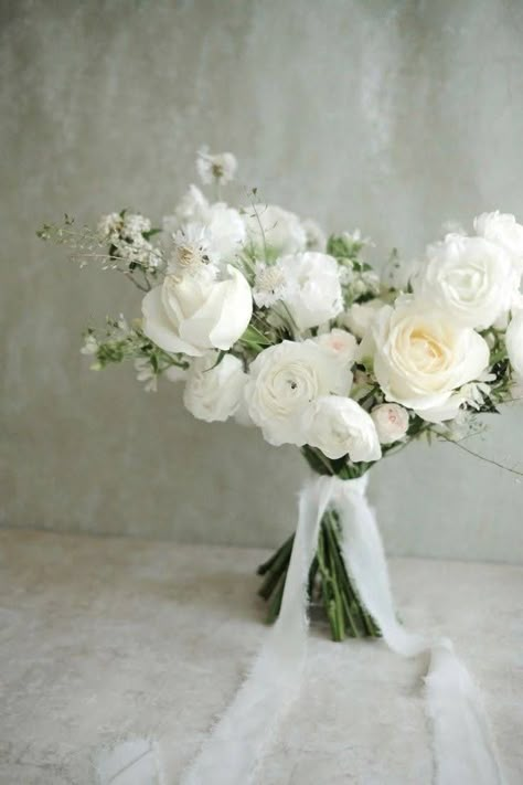 Rustic White Bridal Bouquet, White Rose And Magnolia Bouquet, Monochromatic Bridal Bouquet, Loose White Bouquet, White And Green Ceremony Flowers, White Ranunculus Wedding Bouquet, Dainty Wedding Bouquet, Ranculus Flowers Bouquet, Whimsical Bridesmaid Bouquet