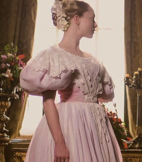 Les Misérables (2012) - Amanda Seyfried as Cosette wearing a pink dress with short puffy sleeves, round neckline and white embroidered muslin overlay on the bodice and sleeves.  The costumes were designed by Paco Delgado 1830s Aesthetic, Cosette Aesthetic, Les Miserables Aesthetic, Carmilla Karnstein, Les Miserables Costumes, Cloth Reference, Movie Wedding Dresses, Character Creating, Worst Wedding Dress