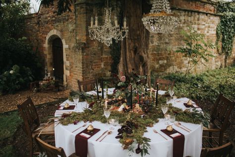 A Secret Garden Banquet Mossy Table Decor, Witchy Wedding Table Setting, Whimsical Wedding Round Table, Moss Tablescape Wedding, Moss Table Centerpiece, Enchanted Forest Wedding Table Decor, Circle Table Settings Wedding, Moss Table Setting, Secret Garden Party Theme