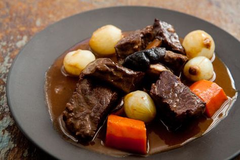 Luxurious beef bourguignon, or beef Burgundy, with beef chuck, carrots, pearl onions, mushrooms, and coated with a deeply flavored, silky sauce. Beef Burgundy, Beef Bourguignon Recipe, Salt Pork, Pearl Onions, How To Cook Mushrooms, Beef Chuck, Beef Short Ribs, Think Food, Simply Recipes