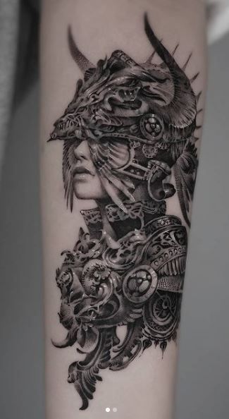 240+ Magnificent Valkyrie Tattoos Ideas and Meaning (2023) - TattoosBoyGirl Valkyrie Skull Tattoo, Female Valkyrie Tattoo, Norse Valkyrie Tattoo, Valkyrie Helmet Tattoo, Spiritual Warrior Tattoo, Valkyrie Tattoo Design Norse Mythology, Valkaryie Tattoo, Valkyrie Tattoo Woman Female Warriors, Viking Tattoos For Women Norse Mythology