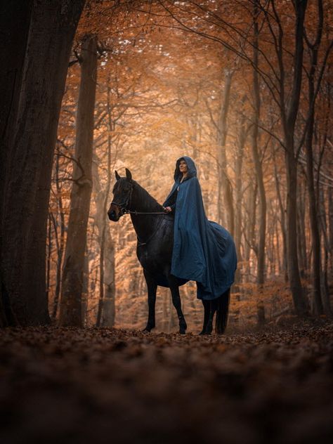 Woman in cloak riding horse in forest by Nature by Louise © Trevillion Images. Woman In Cloak, Horse In Forest, Horse Photoshoot Ideas, Lover Anime, Woman Riding Horse, Horse Photography Poses, Horse Riding Aesthetic, Horse Riding Clothes, Fantasy Horses