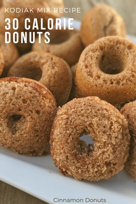 Healthy cinnamon donuts recipe. Made with kodiak mix. high in protein, low in fat, low in calories, and low in sugar. #healthytreats  #healthydonuts  #healthyrecipe Protein Donut Recipe Kodiak, Protein Donuts Kodiak Cakes, Kodiak Cinnamon Oat Recipes, Kodiak Donuts Recipe, Healthy Baked Donut Recipes, Healthy Donut Recipes, Healthy Donut Recipe, Protein Donut Recipe, High Protein Donuts