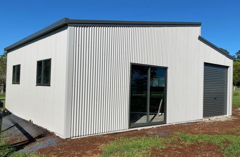 Shed with Enclosed Lean To is the essential addition to your property. What sets this Shed apart, is its exceptional customizability, allowing you to tailor it precisely to your requirements. You have the freedom to choose from various options, including multiple roller doors, glass sliding doors, windows, an access door, or even a mezzanine level. The custom design possibilities are truly limitless, ensuring that your Shed perfectly aligns with your vision for your property Shed With Mezzanine, Shed With Clear Roof, Skillion Roof Shed, Side Lean To Storage Sheds, Steeltech Shed, Mezzanine Floor, Skillion Roof, Backyard Retreat, Look On