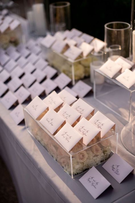 10 Elegant & Creative Escort Card Display Ideas - Mindy Weiss Card Display Ideas, Creative Seating Cards, Wedding Seating Chart Display, Free Wedding Cards, Mindy Weiss, Wedding Seating Cards, Place Card Table Wedding, Card Displays, Interactive Display