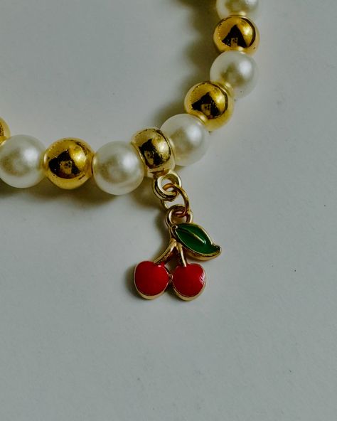 Cherry Bracelet 🍒 #beadbuddies #beadedjewelry #beadedbracelet #handmade #beadedbraceletsforsale #beadlove #beadlover #beadbracelets #jewerlymaker #pearlbeads #goldebeads #bracelets #handmadewithlove #bead #beads #beaded #tutorial #ideas #designs #making #easy #business #patterns #smallbusiness #smallbusinessowner Cherry Bracelet, Handmade Bracelets Tutorial, Tutorial Ideas, Bracelet Tutorial, Handmade Bracelet, Pearl Beads, Beaded Jewelry, Cherry, Bracelet