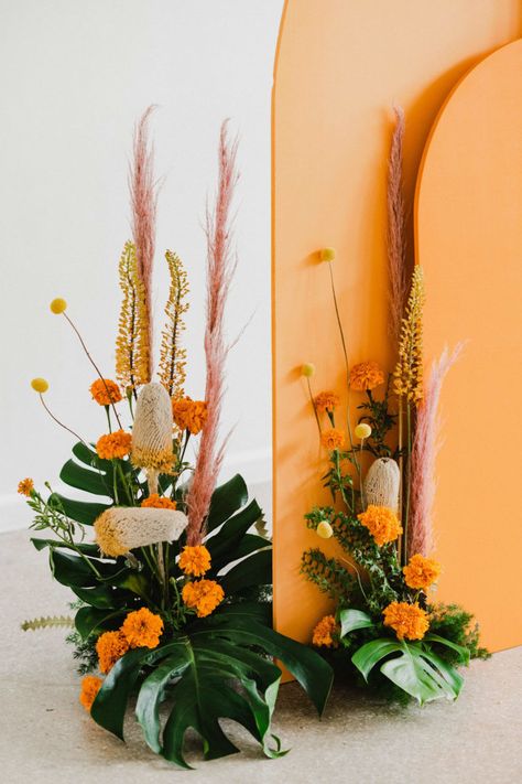 Couples Embracing, Orange Marigolds, Mexican Aesthetic, Yellow Flower Arrangements, Marigold Wedding, Mid Century Modern Wedding, Club Photography, Orange Theme, Floral Archway