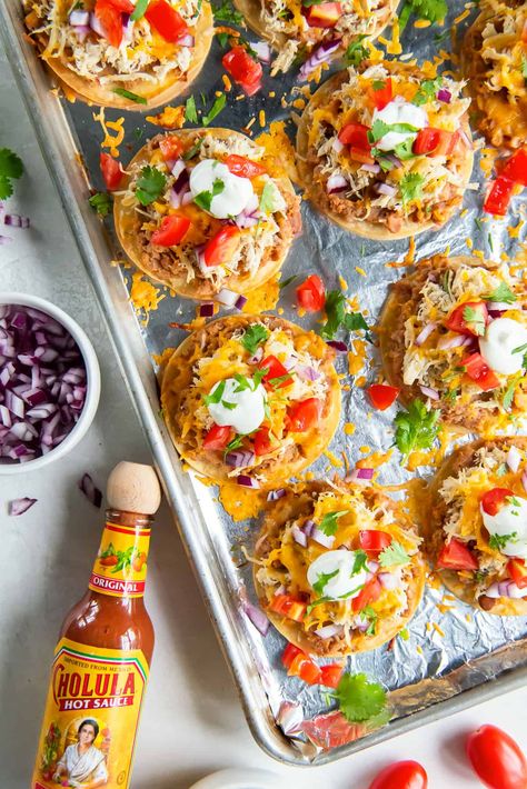 Bake a sheet pan full of these mini chicken tostadas in about 30 minutes for an easy dinner or fun party snack. Crispy baked street taco tortillas are loaded with beans, chicken, cheese and your favorite toppings. Mini Chicken Sheet Pan Tostadas, Mini Sheet Pan Chicken Tostadas, Mini Sheet Pan Tostadas, Sheet Pan Tostadas, Easy Nachos Recipe Beef, Gumbo Recipe Crockpot, Rotisserie Chicken Tacos, Nachos Recipe Easy, Chicken Tostadas