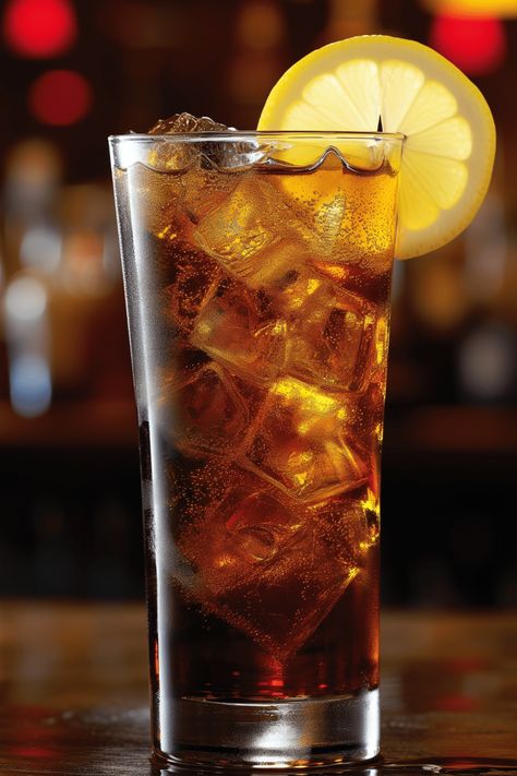 A refreshing and easy Brandy and Coke cocktail recipe featuring brandy, cola, and a hint of lemon, perfect for any occasion. Cowboy Colada, Coke Cocktails, Cola Cocktail, Coke And Liquor Drinks, Brandy Old Fashioned Sweet, Cola Drinks, Corona Beer Cocktails, Types Of Cocktails, Peach Schnapps