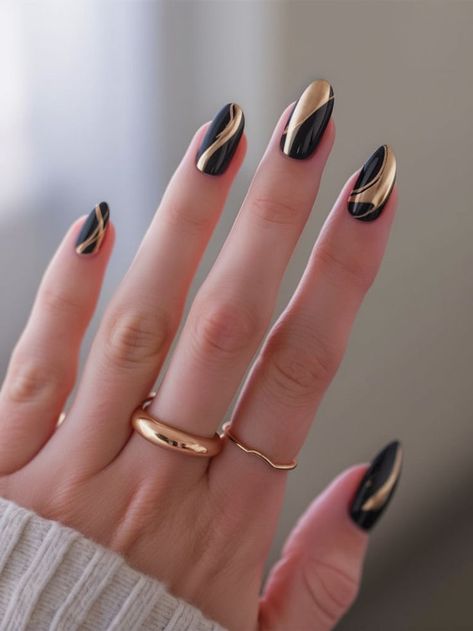 For those who appreciate simplicity with a touch of luxury, this minimalist nail design features a matte black base with sleek, golden abstract lines. The design is clean and modern, offering a chic yet understated elegance. The combination of black and gold is timeless, making this nail art perfect for professional settings, yet bold enough for a night out. Black Chrome Nail, Chrome Nails Ideas, Minimalist Nail Design, Almond French Tips, Chrome Nail Ideas, Black Chrome Nails, Black And Gold Abstract, Old Money Nails, Black Gold Nails