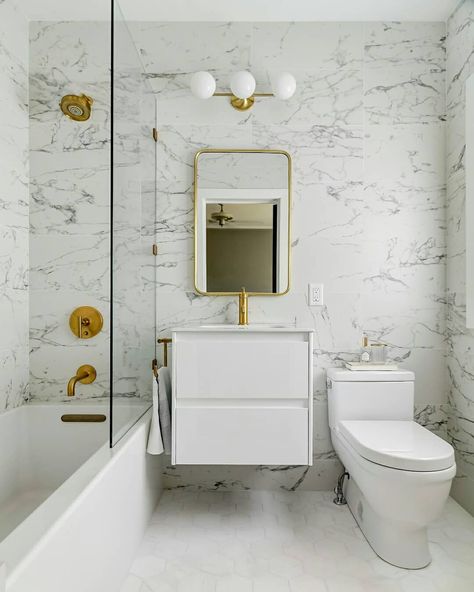 This bathroom is what our floor-to-ceiling tile dreams are made of 🙌 ​Swipe right to see the before! Design by @jaimienelsondesigns. Tiny Bathroom Makeover, Makeover Kamar Mandi, Beautiful Small Bathrooms, Marble Bathroom Floor, Toilet Tiles, Small Bathroom Tiles, Modern Bathroom Tile, Wall Tiles Design, Bathroom Photos