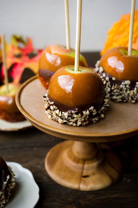 Double Dipped Chocolate Caramel Apples. Because double dipping can be a good thing. This simple recipe makes for the perfect Halloween treat! Learn how to make caramel apples with this delicious recipe! // caramel apple recipe // chocolate caramel apples #sponsored #caramelapples #candyrecipe #caramelapplerecipe #kitchenconfidante Caramel Apple Recipes, Caramel Apple Recipe Easy, Caramel Apple Recipe, Caramel Recipe Easy, Chocolate Caramel Apples, Caramel Apples Homemade, Caramel Apples Recipe, Caramel Apples Easy, Easy Caramel