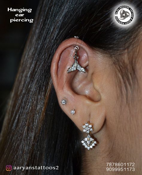 Hanging helix piercing 🔹SafeHygienicSterile hanginghelixpiercing helixpiercing safe hygienic sterile bestpiercing piercing motera chandkheda ahemdabad gandhinagarFollow for more@aaryanstattoos29 first floor 4d square mall visat gandhinagar road motera chandkheda Ahmedabad Gujarat 382424Shop timing 11am to 8pmContact for bookingChandkheda:7878601172 Motera:9099951173 Helix Hanging Piercing, Hanging Ear Piercing, Koppu Earring, Hanging Helix Piercing, Indian Ear Piercing, Minimalist Ear Piercings, Nose Ring Jewelry, Ear Piercings Helix, Cool Ear Piercings