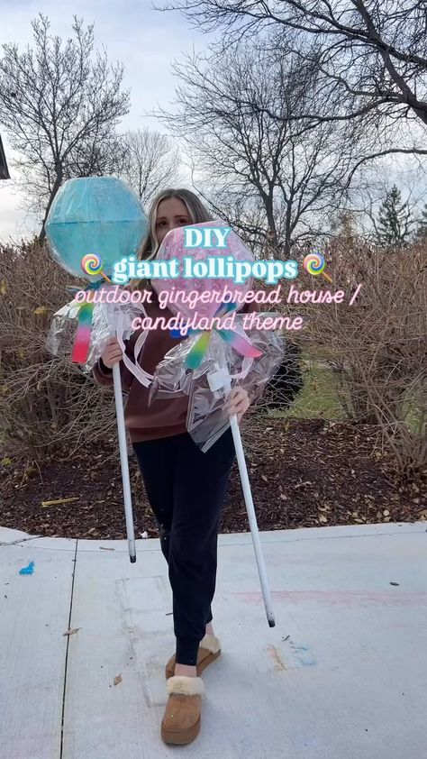 Lauren Engle | DIY giant lollipops! I made these last year and I will be reusing them this year🍭🎄 i love them so much🥹 Comment “sparkles” and I can send... | Instagram Diy Giant Lollipops, Kindergarten Hallway, Candyland Diy, Outdoor Gingerbread House, Gingerbread Candyland, Giant Lollipops, Candyland Theme, Gingerbread Ideas, Work Decor