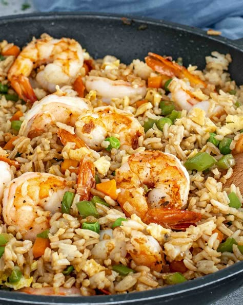 Skip the takeout and make this Easy Shrimp Fried Rice at home! Packed with tender shrimp, veggies, and fluffy rice, it's ready in just 30 minutes! #ShrimpFriedRice #EasyDinner #HomemadeFriedRice #QuickMeals #HealthyTakeout Easy Shrimp Fried Rice Recipe, Easy Shrimp Fried Rice, Fried Rice At Home, Homemade Fried Rice, Rice Dishes Recipes, Shrimp Fried Rice Recipe, Pork Fried Rice, Fluffy Rice, Shrimp Fried Rice