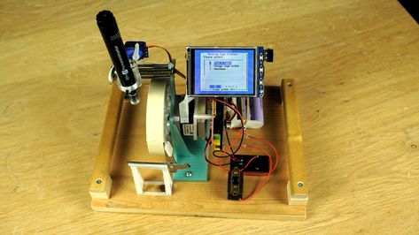 This is an appliance that plots labels on ordinary masking tape. It uses Hershey Fonts and GRBL and the stepper assembly from a DVD drive. What makes it noteworthy (other that the fact that it is the first of its kind) is that the DVD drive assembly has not been used as a whole as in so many "tiny CNC machine" projects, but I designed a custom y-carriage with 3mm steel rods, bronze sinter bearings and a 3d-printed "nut". I used both FreeCAD and Blender as both apps have their specific ... Cnc Machine Projects, Cnc Software, Sticky Labels, Diy Cnc, Dvd Drive, Cnc Design, Cnc Plasma, Stepper Motor, Steel Rod