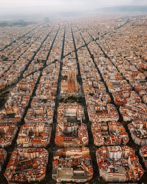 Soaring above Barcelona, a mosaic of history, culture, and coastline 🇪🇸 This breathtaking aerial perspective shows the famous grid of Barcelona’s Eixample district, a testament to the city’s architectural heritage. From the Sagrada Familia’s spires reaching for the sky to the sprawling expanse of the Mediterranean Sea, Barcelona is full of vibrant energy and offers a unique city escape. 📸 @lifeoutofourbackpack #VirtuosoTravel #SoVirtuoso Barcelona Eixample, Barcelona Skyline, Reaching For The Sky, Things To Do In Spain, Aerial Perspective, Travel In Spain, City Escape, Iberian Peninsula, Campaign Ideas