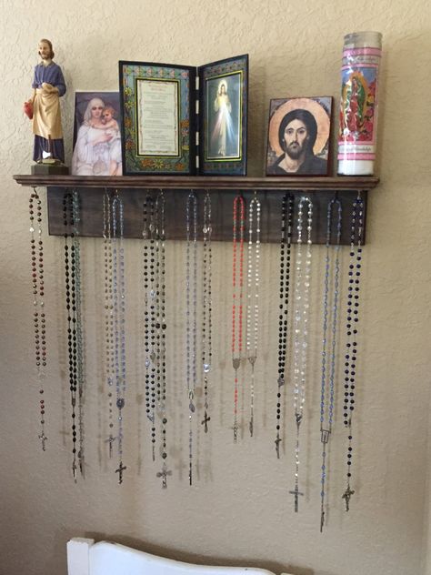 Rosary Holder Wall, Rosary Display Ideas, Alter Design For Home Catholic, Catholic Room Decor, Rosary Storage, Catholic Bedroom, Christian Apartment, Rosary Display, Rosary Hanger