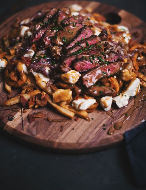 Beef Ribeye Steak, Poutine Recipe, Frozen French Fries, Poutine, Ribeye Steak, Cooking Ingredients, Onion Rings, Polenta, Caramelized Onions