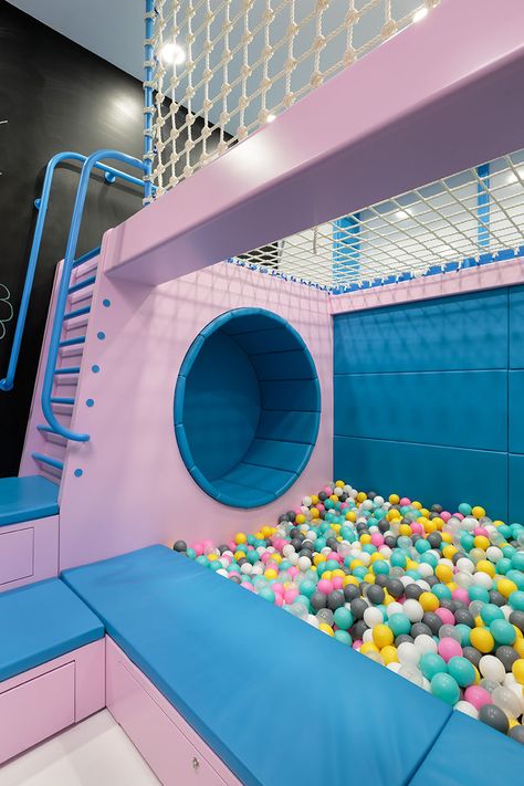 This modern kids play area with a ball pit, seating nook, a chalkboard wall, and a ladder that leads to a net for relaxing in. #KidsPlayArea #BallPit Ball Pit Room, Indoor Playroom, Cute Bedroom Ideas, Saint Petersburg Russia, Girl Bedroom Designs, Teen Bedroom Decor, Ball Pit, Indoor Playground, Room Design Bedroom