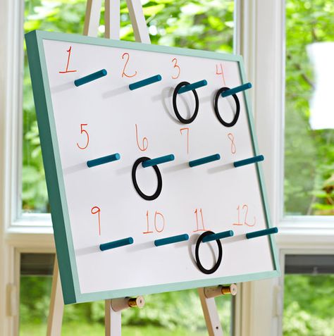 How to build a game board w/ pegs for ring toss  use the other side as a dry erase board.  Idea from Lowe's Home Improvement store. Primary Chorister, Primary Singing Time, Carnival Circus, Ring Toss Game, Indoor Games For Kids, Lds Primary, Ring Toss, Singing Time, Toss Game