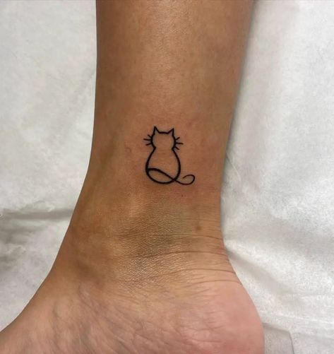 Ankle Tattoo Cat Symbol Small Foot Tattoos Cat Symbol, Small Foot Tattoos, Small Tattoos For Women, Small Finger Tattoos, Ankle Tattoos For Women, Tattoo Themes, Saved Tattoo, Ankle Tattoos, Beautiful Flower Tattoos