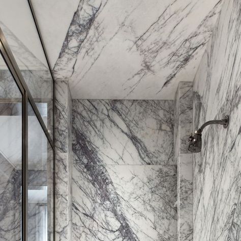 Steven Harris Architects on Instagram: "Shower in the primary bathroom of our West Village Townhouse. Floor-to-ceiling marble adds dynamism to this luxurious space. Interiors by Studio Sofield Image by @selliottphoto #architecture #style #design #interiordesign #designdaily #newyorktownhouse #townhousedesign #newyorkrealestate #bathroomdesign #showerdesign #luxuryrealestatenyc" Lilac Marble, West Village Townhouse, Mosaic Pool Tile, Herringbone Wall, Clay Roof Tiles, Duplex Penthouse, Limestone Wall, Townhouse Designs, Primary Bathroom