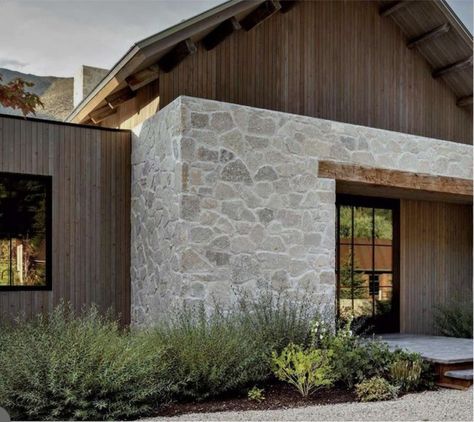 Field Stone House Exterior, Stucco And Wood Exterior, Industrial Farmhouse Exterior, Unique House Exterior, Pantry Door Ideas, Back Of House, Paint Color Ideas, Montana Homes, Cottage Exterior