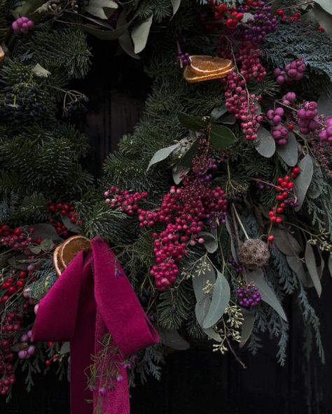 A beautifully crafted luxury Christmas wreath, bursting with an array of vibrant winter berries, truly makes a statement. Among these delightful accents are the lovely pink peppercorns, striking red Ilex berries, charming pink hypericum berries, along with the bold red skimmia, viburnum, and delicate snowberries. . This enchanting wreath showcases a delightful mix of bundles of lush foliage, artfully created with Chamaecyparis Lawsoniana, the exquisite Blau de luxe (Conifer), and fragrant Euc... Ilex Berries, Chamaecyparis Lawsoniana, Christmas Floral Designs, Hypericum Berries, Winter Berries, Brand Aesthetic, Red Wreath, Luxury Christmas, Different Holidays