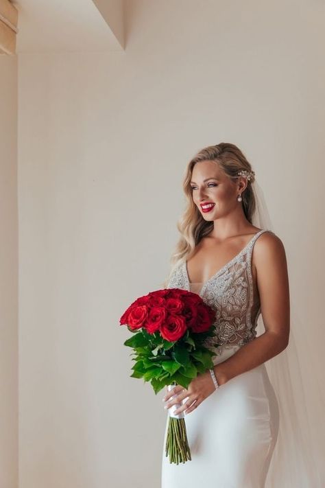 11 Gorgeous Brides That Wore Red Lipstick For Their Wedding Bride With Red Bouquet, Red Lip Wedding Look, Red Lip Bride, Red Lips Bride, Red Lip Wedding, Red Lips Wedding, Bridal Beauty Timeline, Bridal Makeup Red Lips, Bridal Makeup For Green Eyes